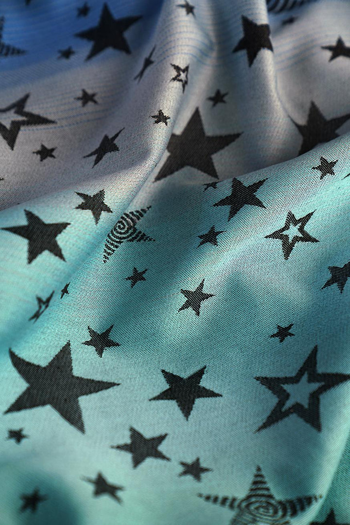 KOKADI Portabebé Flip Matti Estrellas